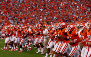 Head coach Dabo Swinney leads the Tigers onto the field at last year's game against Georgia.  (Photo by Streeter Lecka/Getty Images)