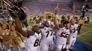 Missouri players celebrate after a lopsided victory against the Gators in The Swamp. 