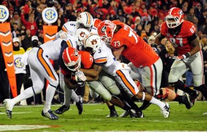 Nick Chubb carries the ball for a second quarter touchdown against the Tigers. The freshmen phenom will now become the #1 guy in Georgia's backfield due to Todd Gurley's season-ending injury. Image via Heavy.com