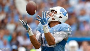 North Carolina's Mack Hollins (13) pulls in a 74-yard pass from quarterback Marquise Williams for a touchdown (Robert Willett/Raleigh News & Observer/TNS)